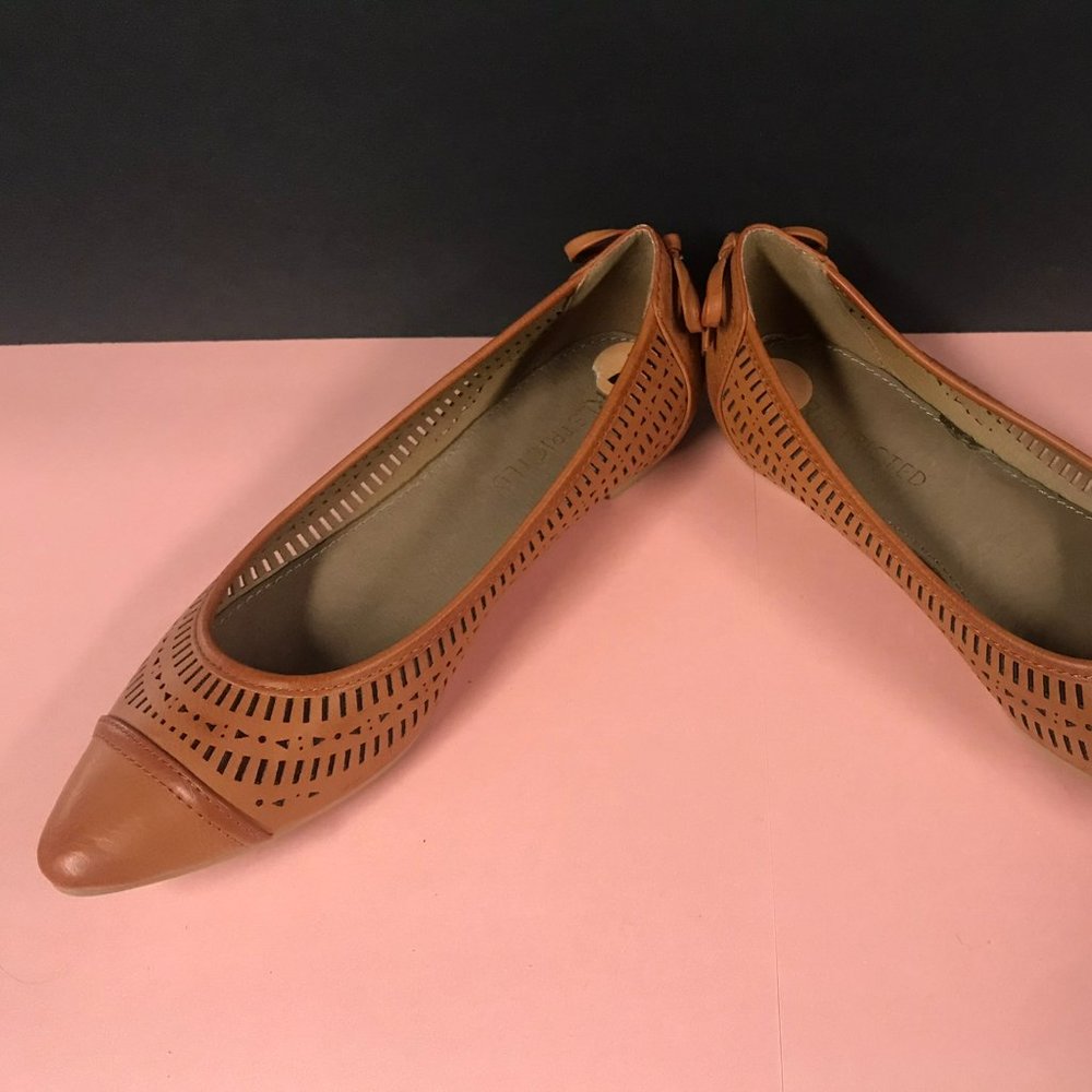 Like new tan flats by Restricted, Size 7